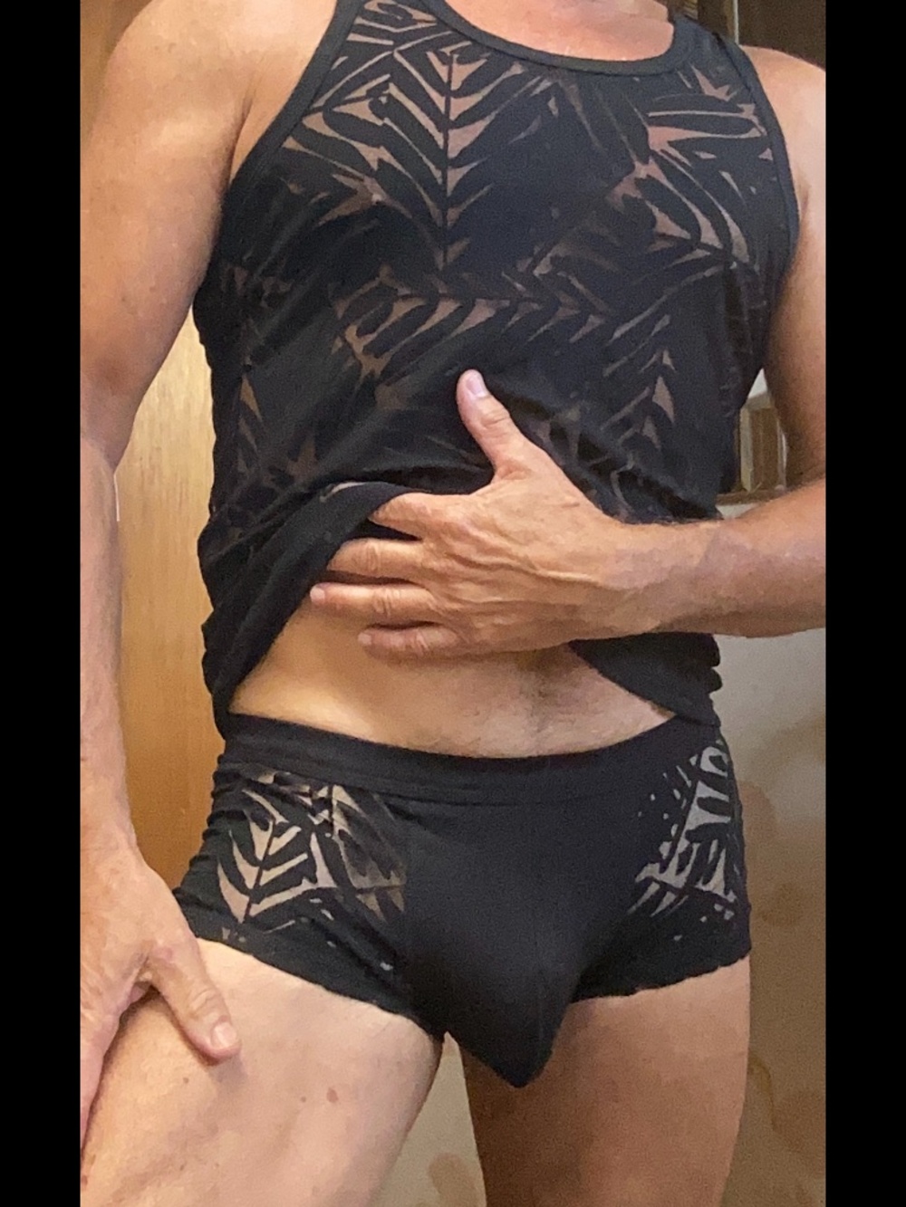 Black see thru pattern trunks and tank top set, tag xl but fits like m.